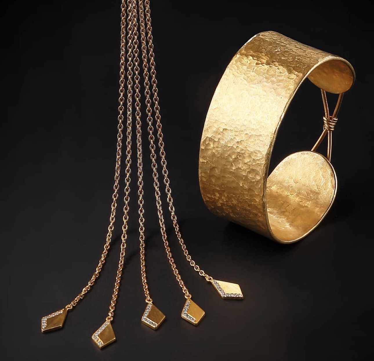Yossi Harari hand-hammered gold cuff and fine gold chains with diamond-set pendants